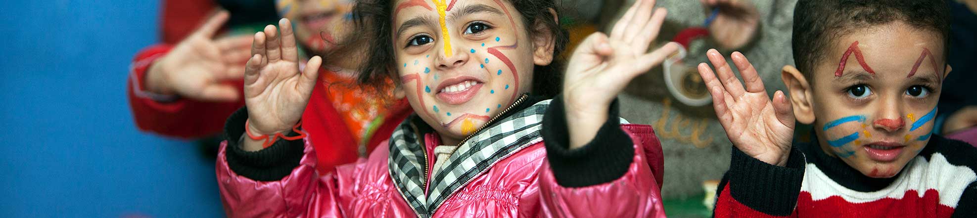 children with their faces painted