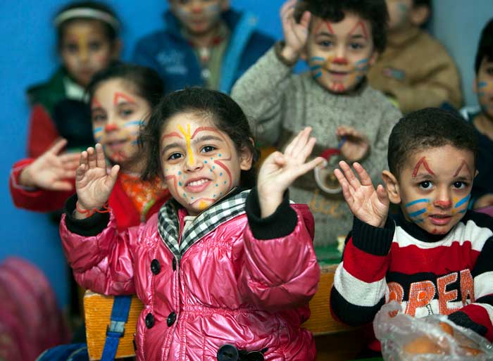 children with painted faces